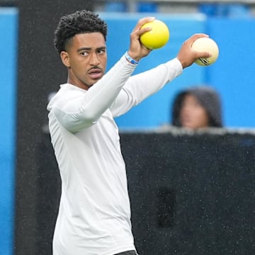 Aug 2, 2025; Charlottle, NC, USA; Carolina Panthers quarterback Bryce Young (9) warms up during Fanfest at Bank of America Stadium. Mandatory Credit: Jim Dedmon-Imagn Images