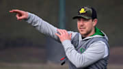 New Oregon offensive coordinator and quarterbacks coach Will Stein leads a drill on the first practice of spring for Oregon football as the Ducks prepare for the 2023 season.

Eug 031623 Uo Spring Fb 15
