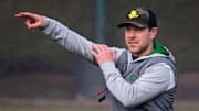 New Oregon offensive coordinator and quarterbacks coach Will Stein leads a drill on the first practice of spring for Oregon football as the Ducks prepare for the 2023 season.

Eug 031623 Uo Spring Fb 15