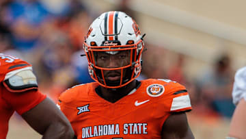 Aug 31, 2024; Stillwater, Oklahoma, USA; Oklahoma State Cowboys linebacker Nick Martin (4) ready for a play during the fourth quarter against the South Dakota State Jackrabbits at Boone Pickens Stadium. Mandatory Credit: William Purnell-Imagn Images