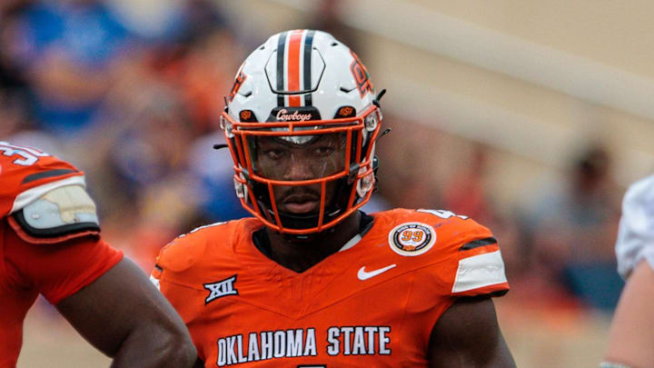 Aug 31, 2024; Stillwater, Oklahoma, USA; Oklahoma State Cowboys linebacker Nick Martin (4) ready for a play during the fourth quarter against the South Dakota State Jackrabbits at Boone Pickens Stadium. Mandatory Credit: William Purnell-Imagn Images