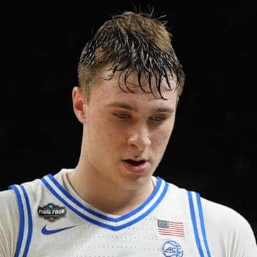 Apr 5, 2025; San Antonio, TX, USA; Duke Blue Devils forward Cooper Flagg (2) walks off the court after losing to the Houston Cougars in the semifinals of the men's Final Four of the 2025 NCAA Tournament at the Alamodome. Mandatory Credit: Robert Deutsch-Imagn Images