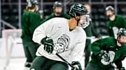 Michigan State's Cayden Lindstrom moves with the puck during hockey practice on Thursday, Sept. 25, 2025, at Munn Arena in East Lansing.