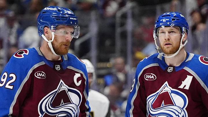 May 22, 2026; Denver, Colorado, USA; Colorado Avalanche left wing Gabriel Landeskog (92) and center Nathan MacKinnon (29) react following a Vegas Golden Knights goal during the third period of game two of the Western Conference Final of the 2026 Stanley Cup Playoffs at Ball Arena. Mandatory Credit: Ron Chenoy-Imagn Images
