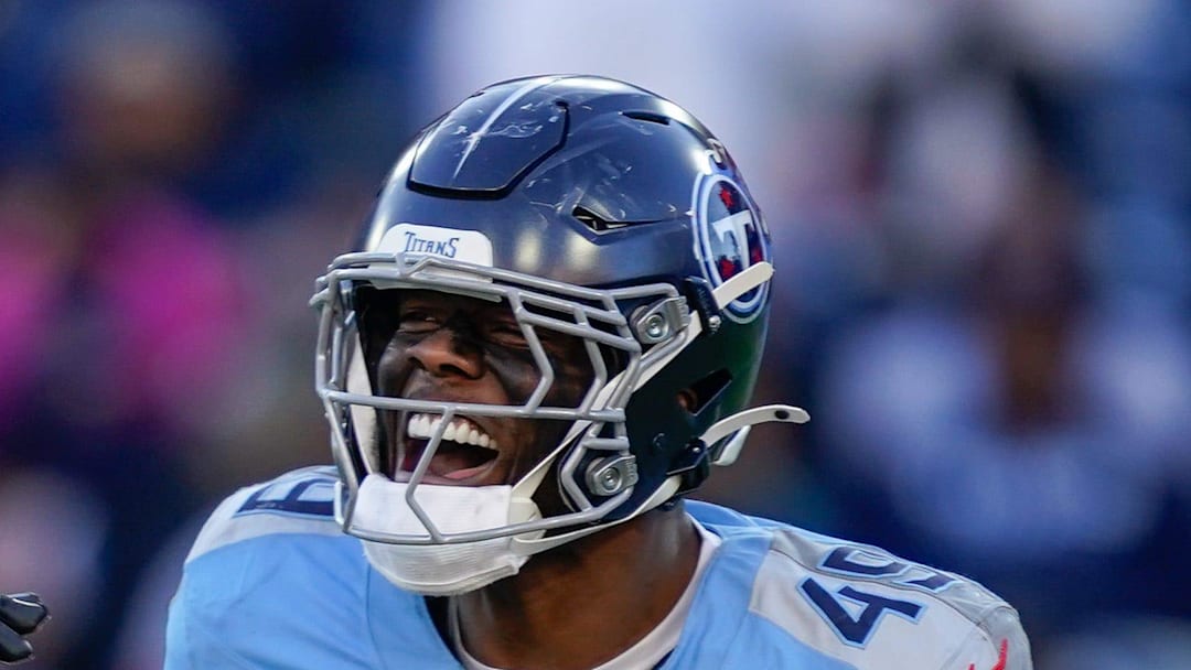Tennessee Titans linebacker Jihad Ward and linebacker Arden Key celebrate the sack.