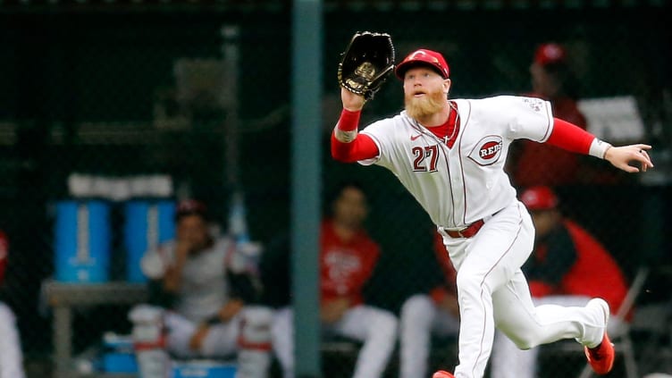 Cincinnati Reds center fielder Jake Fraley (27) tracks and catches a line drive.