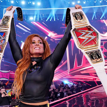 Becky Lynch celebrates after her historic win in the main event of WrestleMania 35