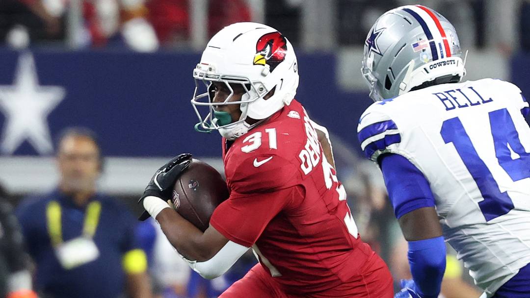 Arizona Cardinals running back Emari Demercado runs against Dallas Cowboys safety Markquese Bell at AT&T Stadium. Arizona Cardinals running back Emari Demercado runs against Dallas Cowboys safety Markquese Bell at AT&T Stadium.