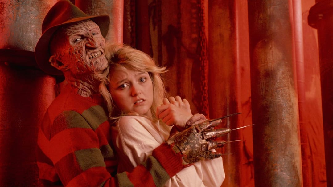 Freddy Krueger (Robert England) has Kirsten (Tuesday Knight) in his clutches in “A Nightmare on Elm Street 4: The Dream Master.”