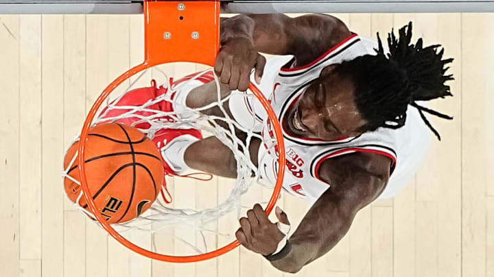 Ohio State is a small home favorite to Michigan in Sunday's college basketball action.