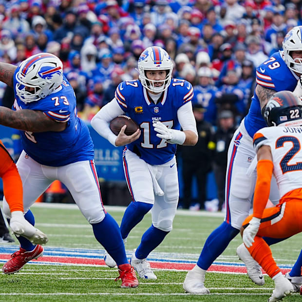 Josh Allen (17) runs