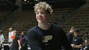 Purdue Boilermakers guard Jack Benter (14) smiles after dunking the ball Sunday