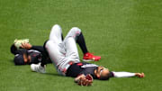 Byron Buxton and Carlos Correa after a scary collision in the third inning on Thursday.