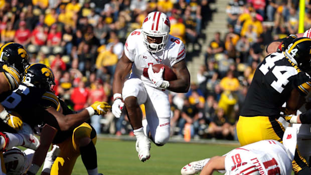 Wisconsin Badgers running back Corey Clement (6) finds an opening against Iowa 