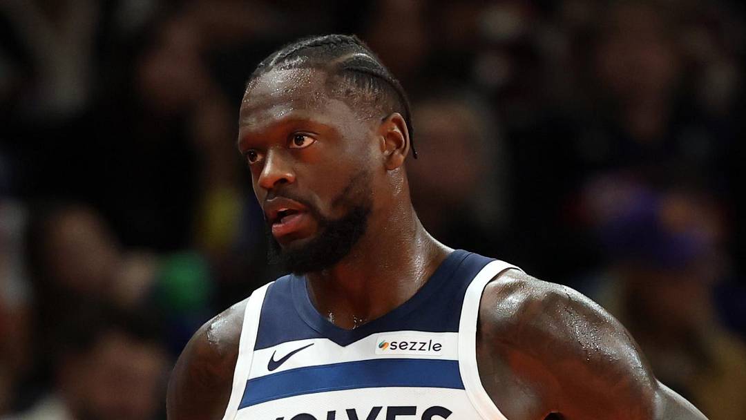 Nov 21, 2025; Phoenix, Arizona, USA; Minnesota Timberwolves head coach Chris Finch with forward Julius Randle (30) against the Phoenix Suns during an NBA Cup game at Mortgage Matchup Center. Mandatory Credit: Mark J. Rebilas-Imagn Images