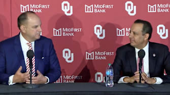 Oklahoma AD Joe Castiglione (left) and president Joe Harroz
