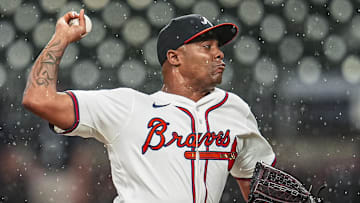 Aug 20, 2025; Cumberland, Georgia, USA; Atlanta Braves relief pitcher Raisel Iglesias (26) pitches against the Chicago White Sox during the ninth inning at Truist Park. Mandatory Credit: Dale Zanine-Imagn Images