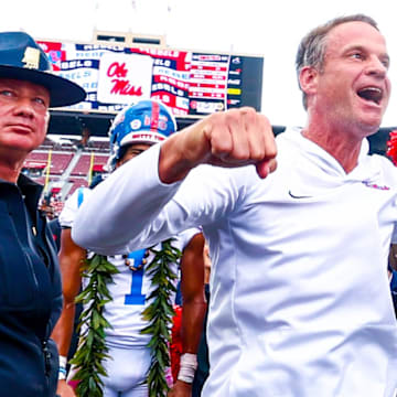 Oct 25, 2025; Norman, Oklahoma, USA;  Ole Miss Rebels head coach Lane Kiffin celebrates with fans after the game against the Oklahoma Sooners at Gaylord Family-Oklahoma Memorial Stadium. Mandatory Credit: Kevin Jairaj-Imagn Images