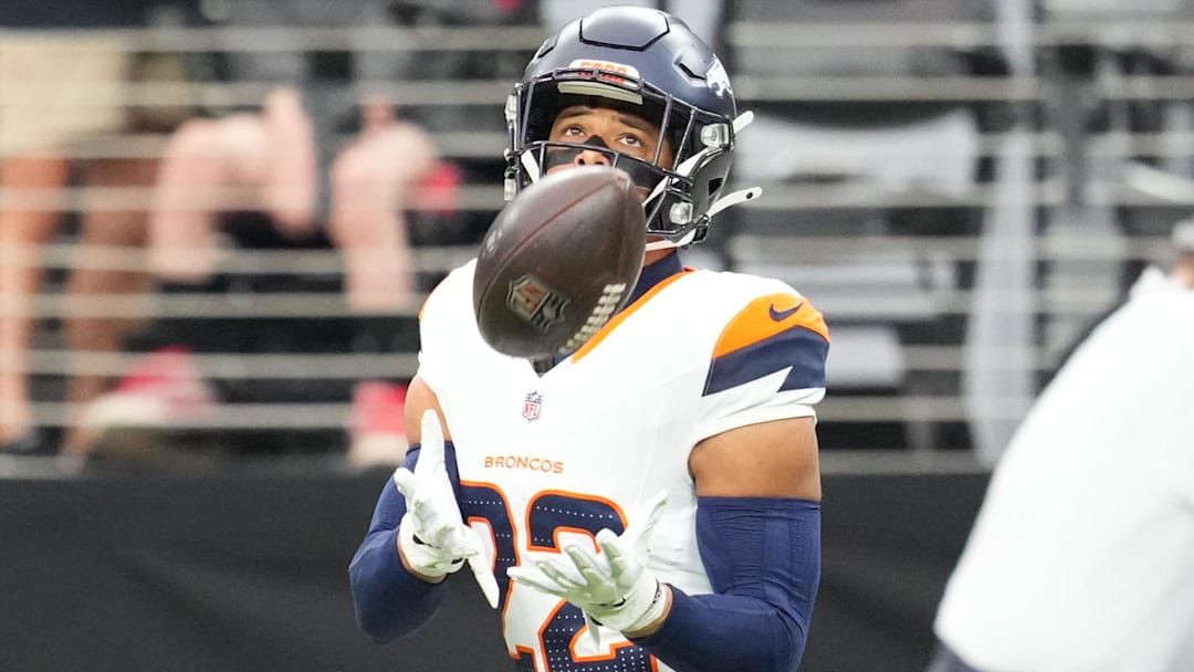 Dec 7, 2025; Paradise, Nevada, USA;  Denver Broncos safety Brandon Jones (22) warms up prior to a game against the Las Vegas Raiders at Allegiant Stadium. Mandatory Credit: Stephen R. Sylvanie-Imagn Images