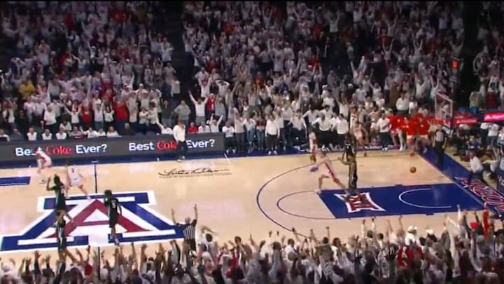 Arizona's Caleb Love hit a half-court shot to send game against Iowa State to overtime. Arizona's Caleb Love hit a half-court shot to send game against Iowa State to overtime.