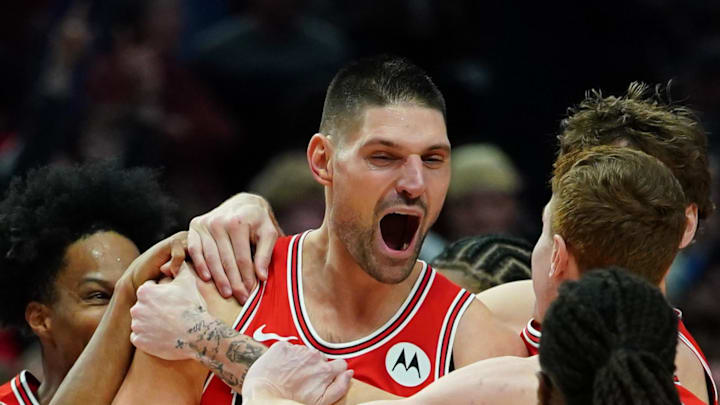 Nov 19, 2025; Portland, Oregon, USA; Chicago Bulls center Nikola Vucevic (9) celebrates with teammates after the game winning buzzer beater three point basket against the Portland Trail Blazers at Moda Center. Mandatory Credit: Soobum Im-Imagn Images