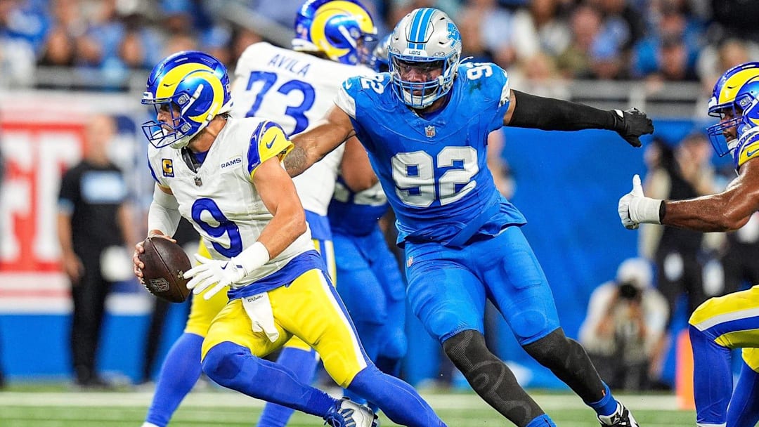 Detroit Lions defensive end Marcus Davenport (92) pressures Los Angeles Rams quarterback Matthew Stafford (9) during the first half at Ford Field in Detroit.