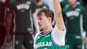 Nov 10, 2025; Dallas, Texas, USA;  Dallas Mavericks forward Cooper Flagg (32) reacts against the Milwaukee Bucks during the fourth quarter at American Airlines Center. Mandatory Credit: Kevin Jairaj-Imagn Images