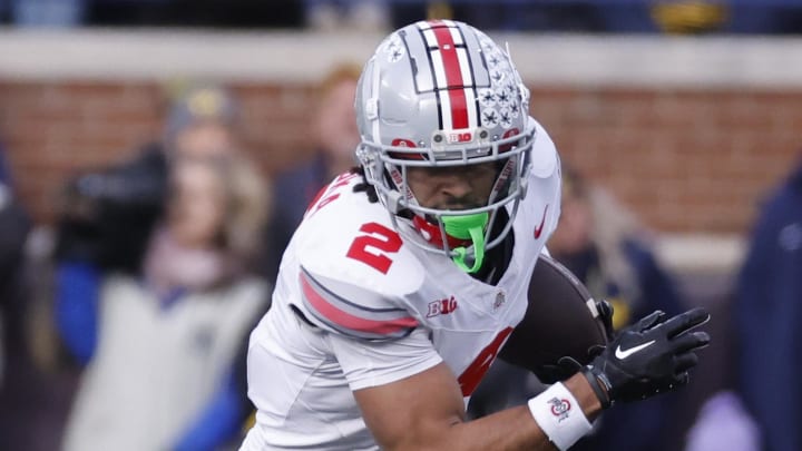 Nov 25, 2023; Ann Arbor, Michigan, USA; Ohio State Buckeyes wide receiver Emeka Egbuka (2) runs the ball in the second half against the Michigan Wolverines at Michigan Stadium. Mandatory Credit: Rick Osentoski-USA TODAY Sports