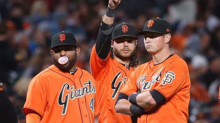 Sep 29, 2017; San Francisco, CA, USA; (l to r) San Francisco Giants third baseman Pablo Sandoval (48) ,  shortstop Brandon Crawford (35) , second baseman Joe Panik (12) and left fielder Jarrett Parker (6) in the game against the San Diego Padres during the third inning at AT&T Park. Mandatory Credit: Stan Szeto-Imagn Images