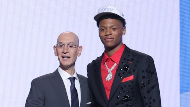     Ace Bailey is with the NBA commissioner Adam Silver