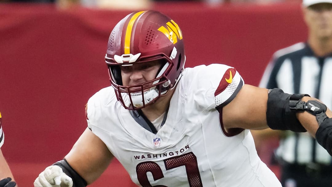 Sep 29, 2024; Glendale, Arizona, USA; Washington Commanders guard Nick Allegretti (67) against the Arizona Cardinals at State Farm Stadium. Mandatory Credit: Mark J. Rebilas-Imagn Images
