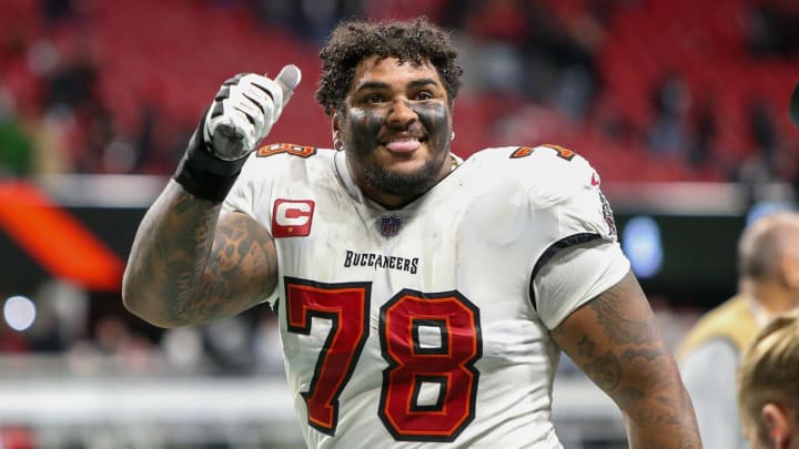 Dec 10, 2023; Atlanta, Georgia, USA; Tampa Bay Buccaneers offensive tackle Tristan Wirfs (78) celebrates after a victory against the Atlanta Falcons at Mercedes-Benz Stadium. Mandatory Credit: Brett Davis-USA TODAY Sports