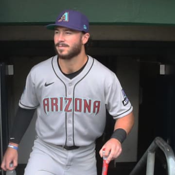 Jul 25, 2025; Pittsburgh, Pennsylvania, USA;  Arizona Diamondbacks first baseman Tristin English (30) enters the dugout to play the Pittsburgh Pirates at PNC Park. Mandatory Credit: Charles LeClaire-Imagn Images