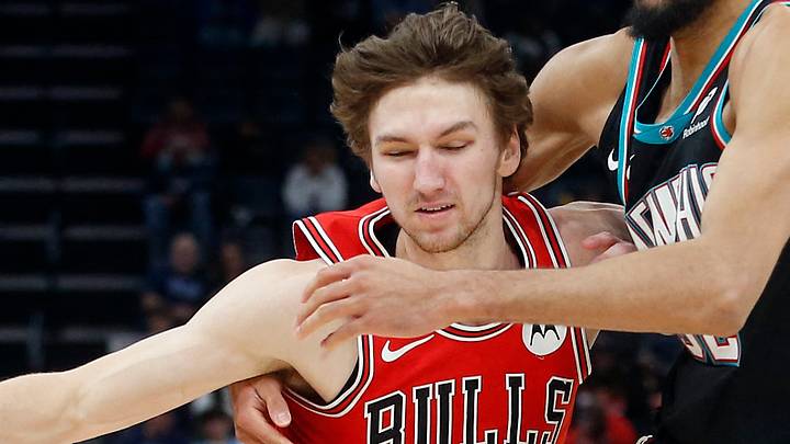 Mar 28, 2026; Memphis, Tennessee, USA; Chicago Bulls forward Matas Buzelis (14) drives to the basket as Memphis Grizzlies guard Rayan Rupert (32) defends during the fourth quarter at FedExForum. Mandatory Credit: Petre Thomas-Imagn Images