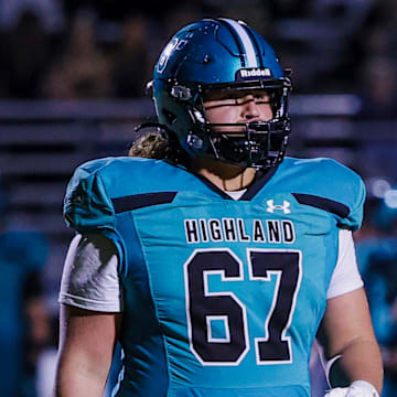 Highland senior Jayden Collins returns to the huddle last week during the Hawks game against Mountain View. Collins will start his 10th game this season after suffering severe leg injury a year ago. 