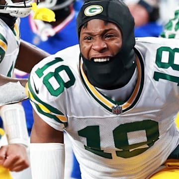 Green Bay Packers receiver Malik Heath (18) celebrates after making a touchdown catch during the fourth quarter against the Giants in 2023.
