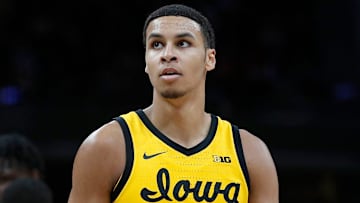 Iowa Hawkeyes forward Keegan Murray (15) rests during the first half of the Big Ten championship title game Sunday, March 13, 2022, at Gainbridge Fieldhouse in Indianapolis. Iowa won, 75-66.