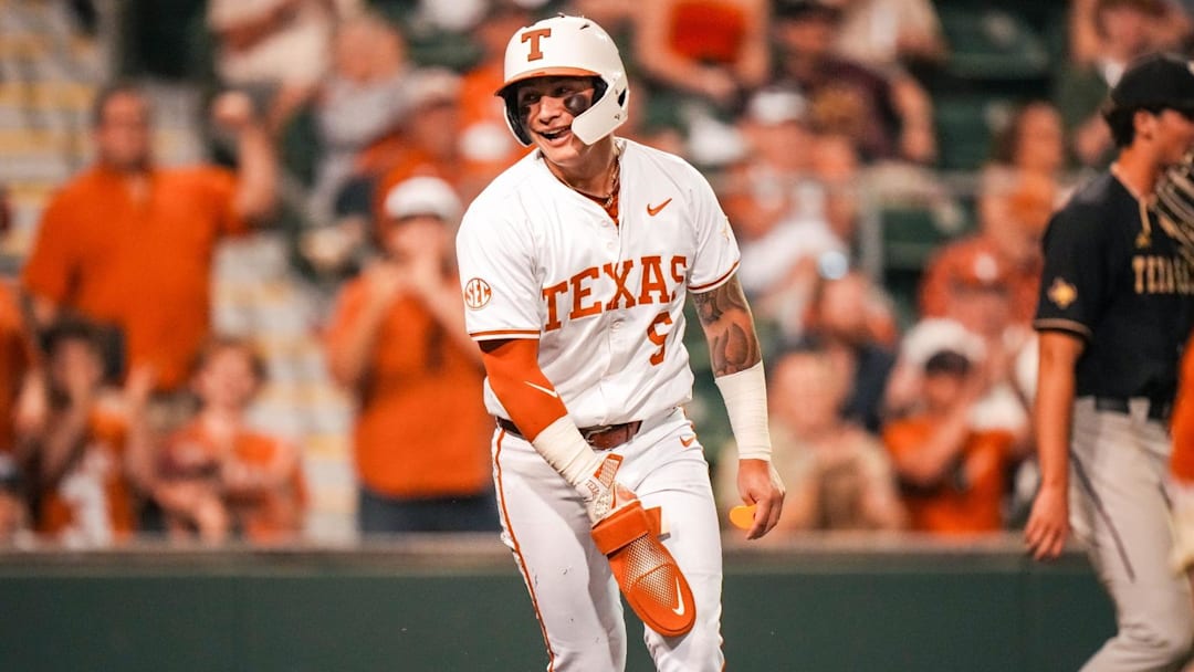 Texas Longhorns second baseman Ethan Mendoza celebrates after scoring against the Texas State Bobcats
