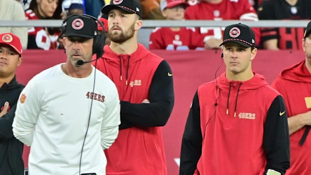 Jan 5, 2025; Glendale, Arizona, USA;  San Francisco 49ers quarterback Brock Purdy (right) and head coach Kyle Shanahan (left)