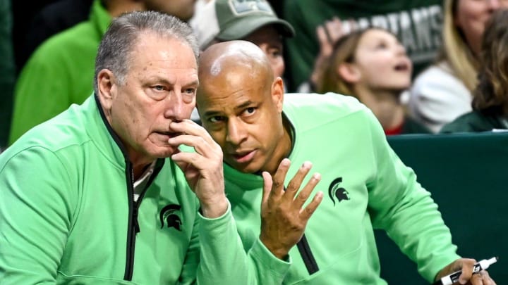 Michigan State assistant coach Mark Montgomery, right, talks with head coach Tom Izzo during the second half of the game against Rutgers on Sunday, Jan. 14, 2024, at the Breslin Center in East Lansing.