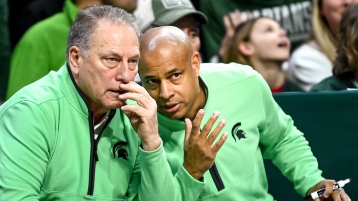 Michigan State assistant coach Mark Montgomery, right, talks with head coach Tom Izzo during the second half of the game against Rutgers on Sunday, Jan. 14, 2024, at the Breslin Center in East Lansing.