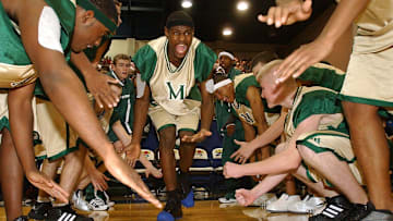 LeBron James (center) was already a household name as a high school basketball player at St. Vincent-St. Mary High School in Akron, Ohio.