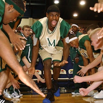 LeBron James (center) was already a household name as a high school basketball player at St. Vincent-St. Mary High School in Akron, Ohio.