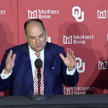 Oklahoma AD Joe Castiglione (left) and president Joe Harroz