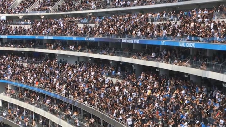 Raiders fans celebrated a touchdown at SoFi Stadium.