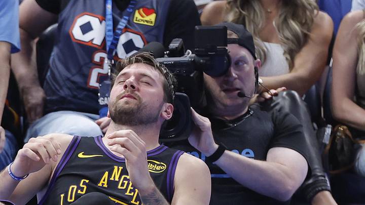 Apr 2, 2026; Oklahoma City, Oklahoma, USA; Los Angeles Lakers guard Luka Doncic (77) falls to the court during a play against the Oklahoma City Thunder during the third quarter at Paycom Center. Mandatory Credit: Alonzo Adams-Imagn Images