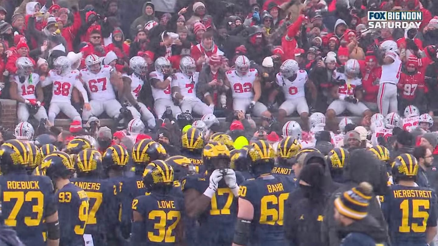 Michigan Players Guard the ‘M’ Logo at Midfield After Ohio State’s Rivalry Win