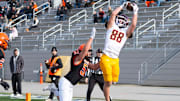 Luke Dehnicke leaping for a catch for Minnesota-Duluth.