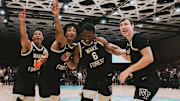 Wake Forest basketball team celebrates after beating Memphis