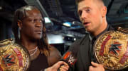 R-Truth and The Miz holding the WWE World Tag Team Championship.